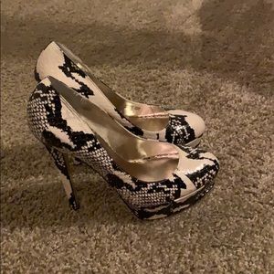 Snakeskin pumps